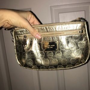 MICHAEL KORS Gold wristlet clutch